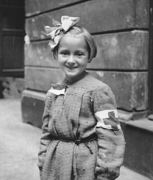 Young Polish Girl Does Her Part With The Red Cross