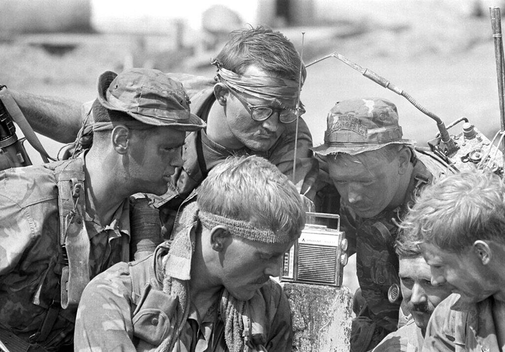 Soldiers Listening to the Moon Landing