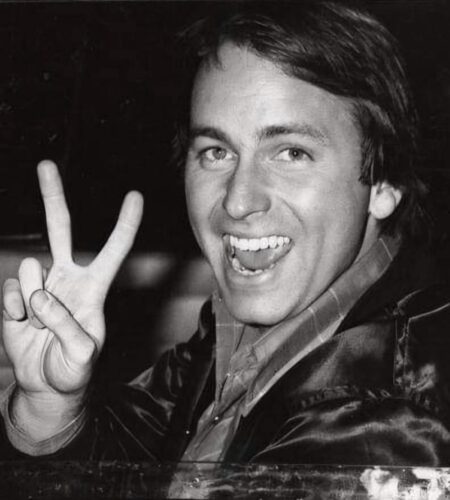 John Ritter in a groovy shirt and flashing his pearly whites in 1970s