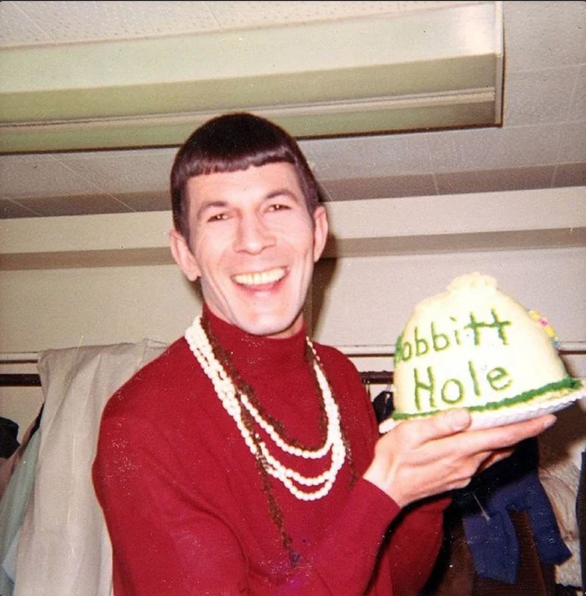 A happy Leonard Nimoy with a Hobbit hole cake in honor of his song The Ballad of Bilbo Baggins, 1968