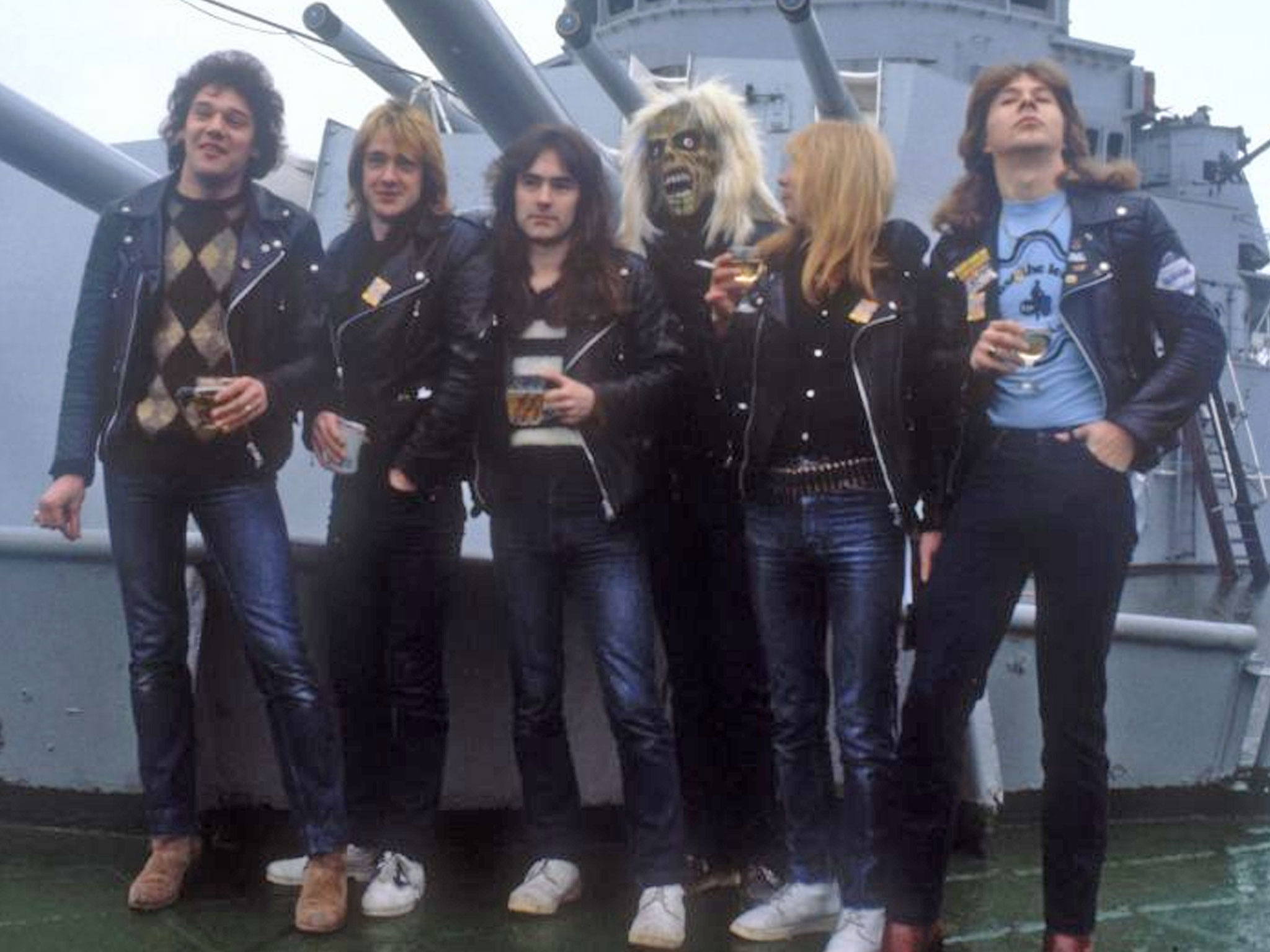 Iron Maiden, with their mascot Eddie, on a battleship in 1981