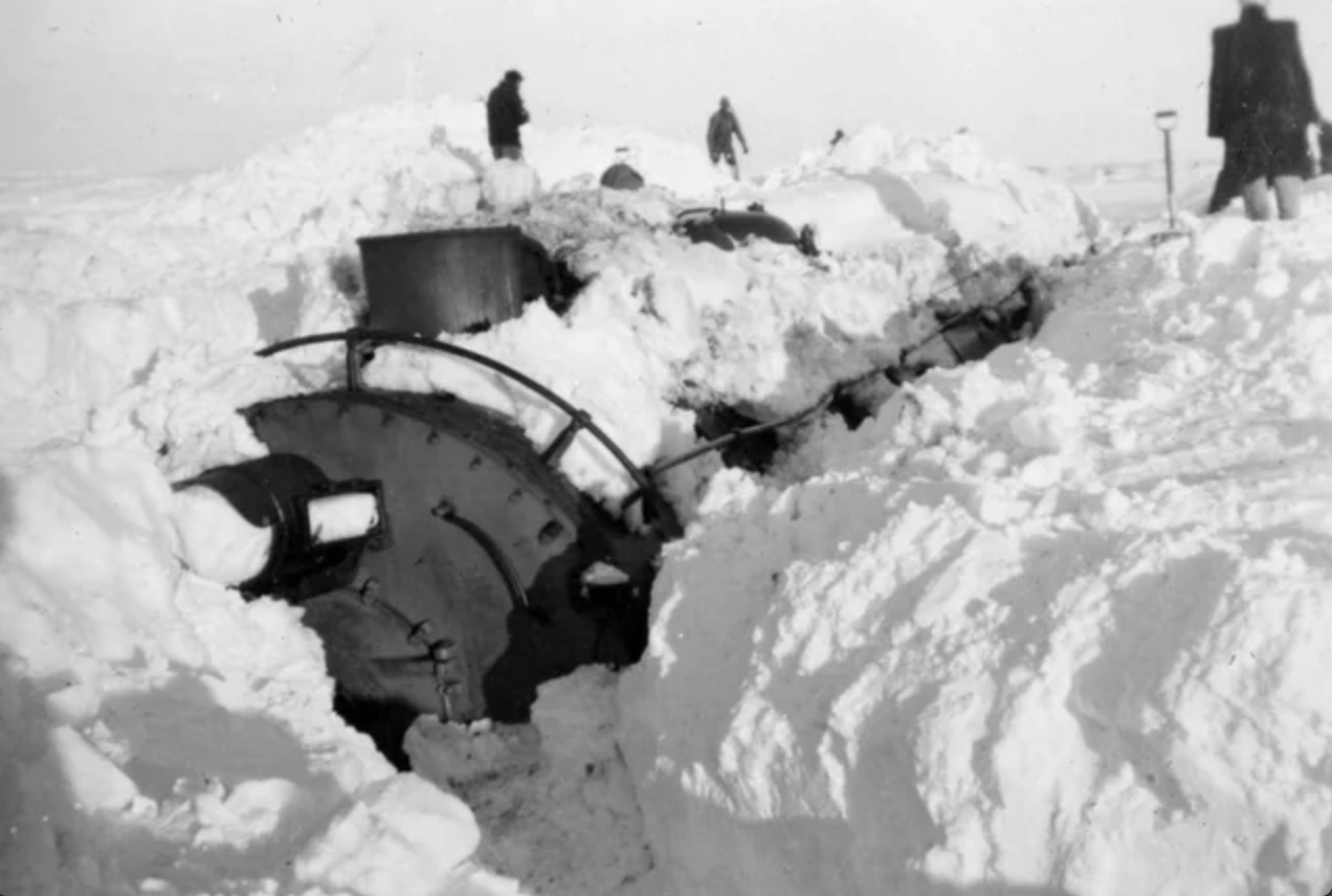 Working hard to dig this locomotive out of snow